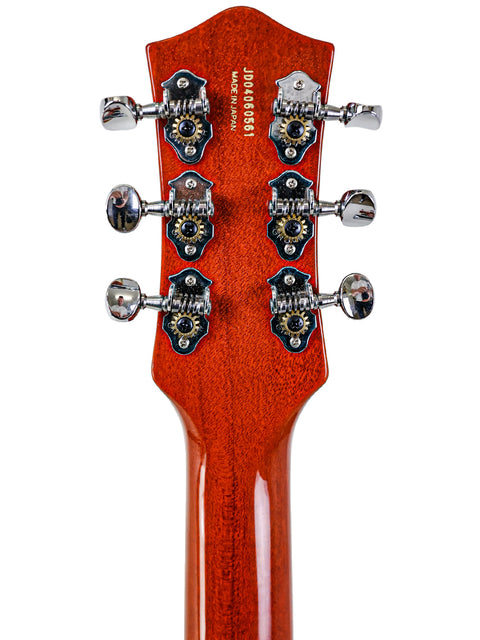 Detailed view of the Gretsch Duo Jet 6128TSP headstock, highlighting its classic design and quality from the 1957 reissue.