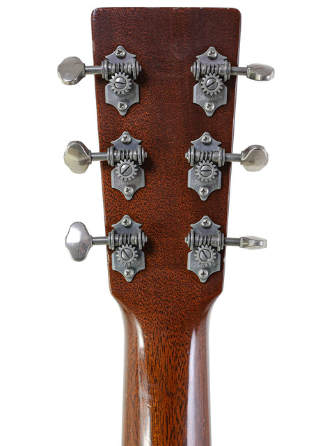 Detailed view of the headstock from a Martin 000-C David Gray Custom guitar, highlighting its prototype features from 2004