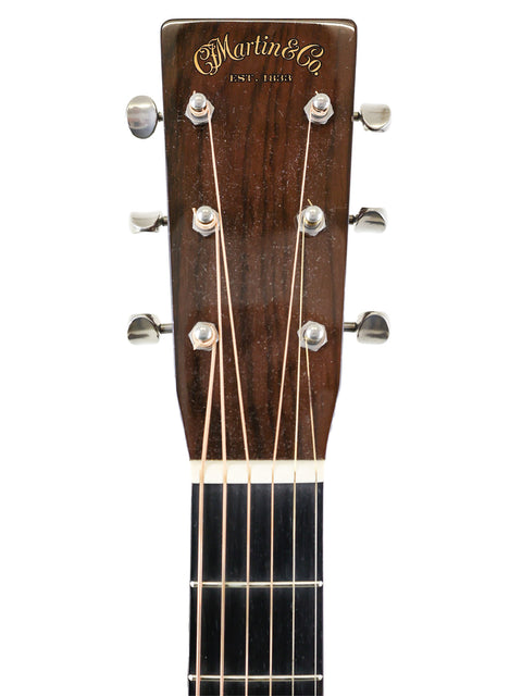 Detailed view of the headstock from a Martin D-18 Authentic 1937 acoustic guitar, highlighting its classic features and finish.