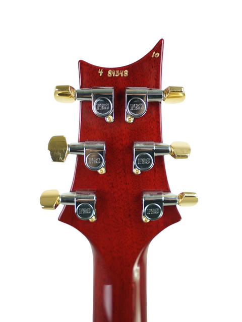 Detailed view of the headstock from a PRS Custom 24 Brazilian Limited electric guitar, highlighting its unique features and finish.