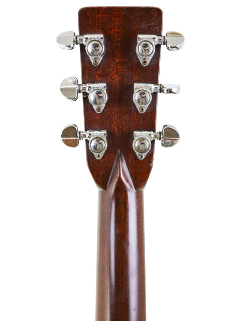 Detailed view of the neck of a 1974 Vintage Martin 000-28 acoustic guitar, illustrating its timeless elegance and craftsmanship.