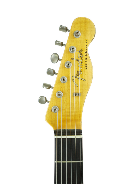 Detailed view of the neck of a 2017 Fender Custom Shop 60s Telecaster, highlighting its heavy relic aging and craftsmanship.