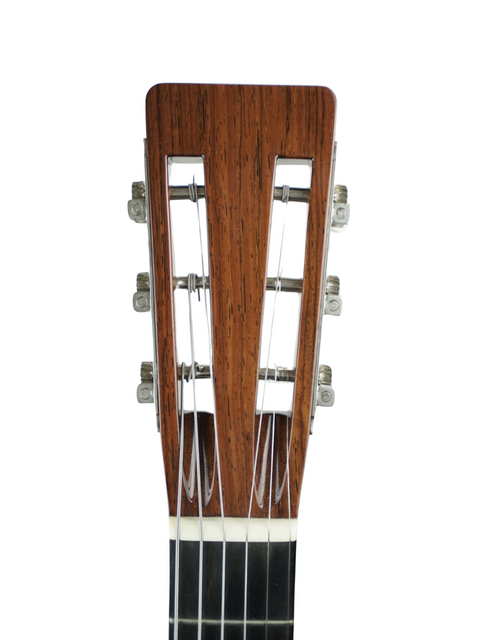 Detailed view of the neck of a Martin 000-28K Authentic 1921 acoustic guitar, highlighting its elegant design and finish.