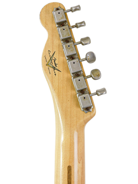 Detailed view of the neck on a Fender Custom Shop 70th Anniversary Broadcaster electric guitar, highlighting its design.