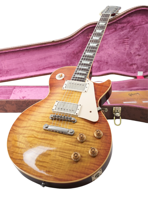 Exceptional Gibson Les Paul '59 Reissue LPR-9 guitar with Brazilian Board, paired with a case for musicians who value protection.