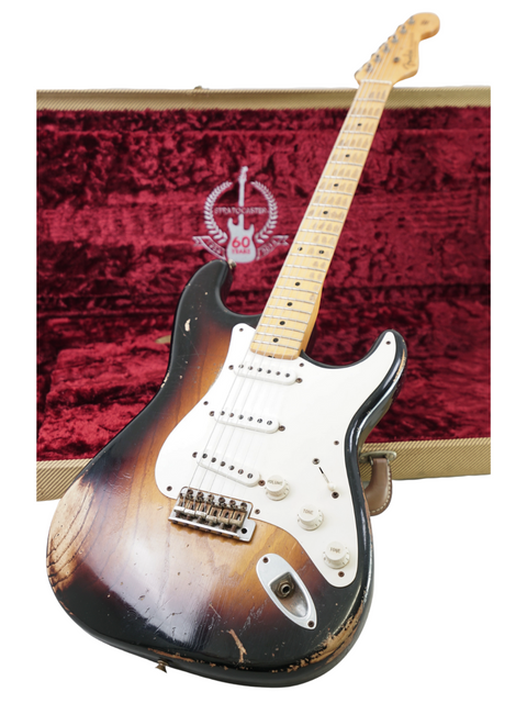 Fender Custom Shop '54 Stratocaster Relic guitar in a wooden case, celebrating 60 years of craftsmanship and design.