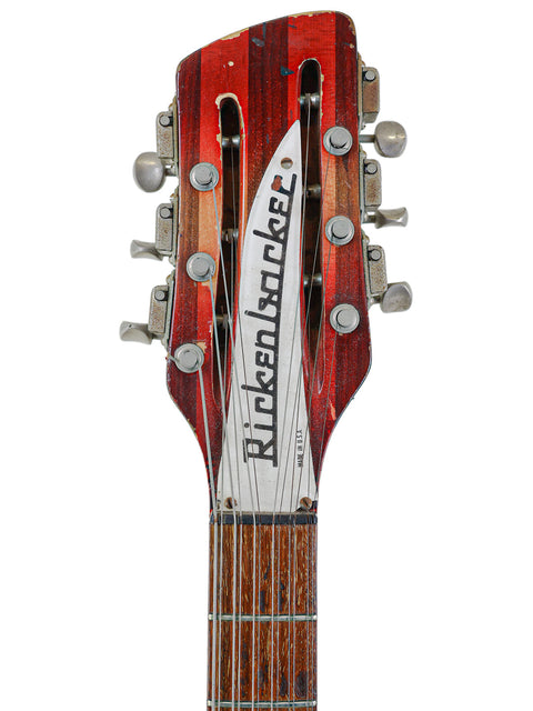 Gibson Hamer HB-3B guitar featured with a 1965 Rickenbacker 12-string, emphasizing vintage style and musical history.