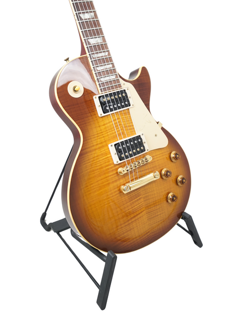Gibson Jimmy Page Signature Les Paul Standard guitar on a stand, Honeyburst finish, limited edition from 1995.