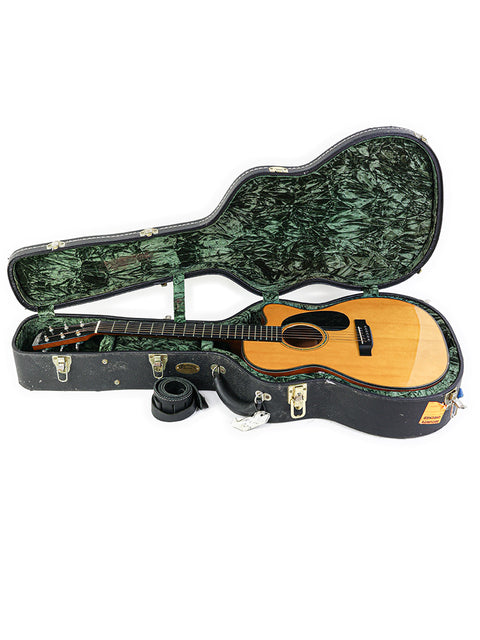 Green guitar case with a wooden body, featuring the Martin 000-C David Gray Custom #1 of 4 Prototype, made in 2004, USA.