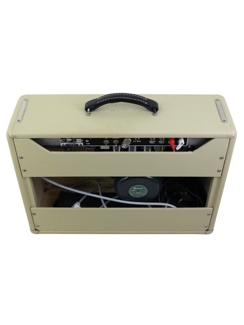 Guitar amplifier featuring a black handle and white cover, identified as 'Lucas Miles Custom Deluxe Combo - Aus 2016'.