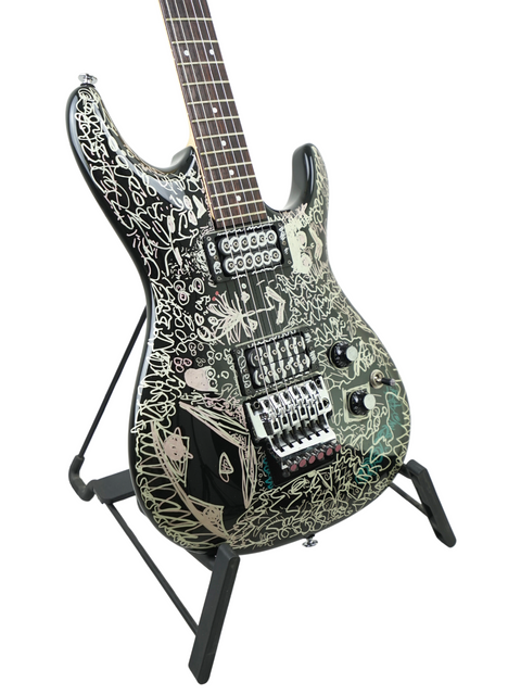 Ibanez Joe Satriani Black Dog guitar featuring a striking black and white design, limited edition from Japan, 2008.