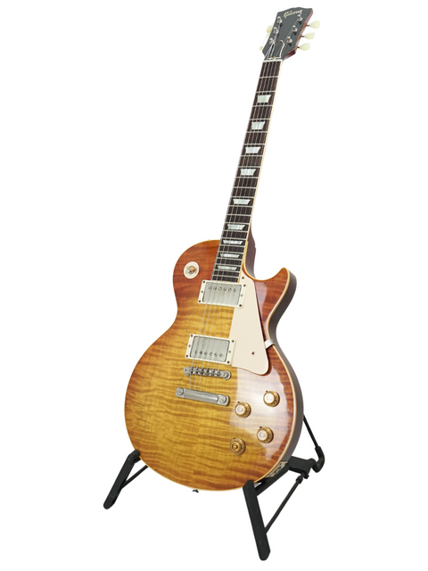 Iconic Gibson Les Paul '59 Reissue guitar displayed on a stand, perfect for collectors and musicians, set against a white backdrop.