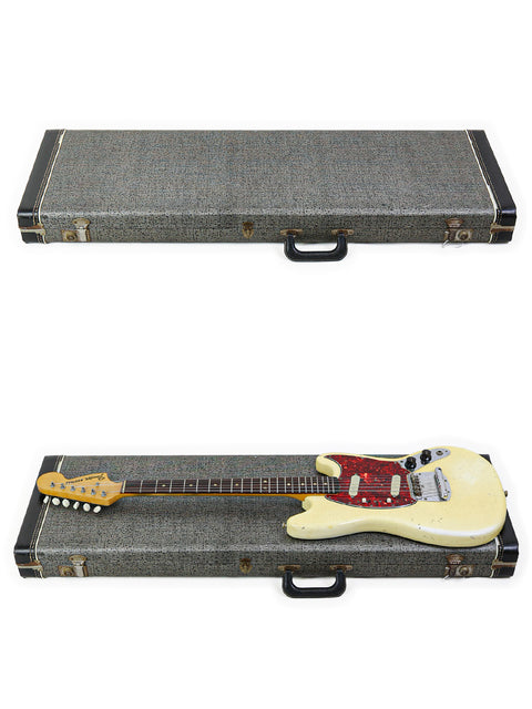 Inside a guitar case, a stunning 1967 Fender Mustang in red and white, highlighting its vintage charm and craftsmanship.