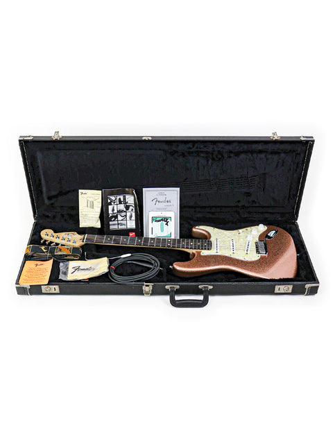 Inside a guitar case lies a 1994 Fender Custom Shop American Classic Stratocaster, exemplifying timeless musical elegance.