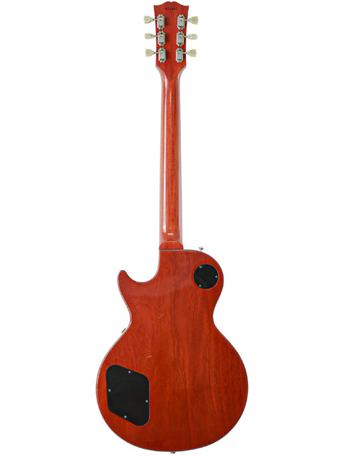 Red Gibson Custom Shop LPR-8 1958 Les Paul Reissue guitar with a wooden body and neck, showcasing classic craftsmanship.
