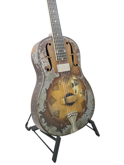 Rustic 1930 National Triolian guitar, featuring a unique design that captures its vintage appeal and craftsmanship.