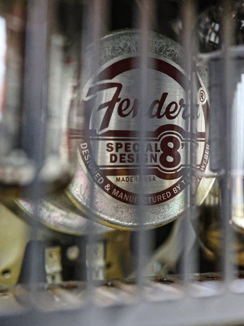 Special edition 8-string Fender guitar alongside a 2009 Fender Custom Shop '57 Champ Combo amplifier.