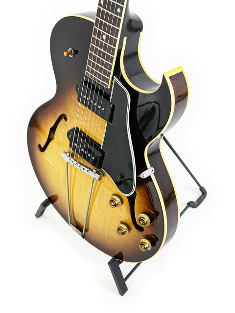 Stunning 1959 Vintage Gibson ES-225TD guitar, featuring a black body and a bright yellow neck, a true collector's item.