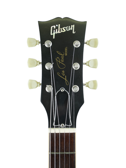 Stunning Gibson Les Paul Custom Shop guitar from 2005, featuring a faded finish and iconic design elements.