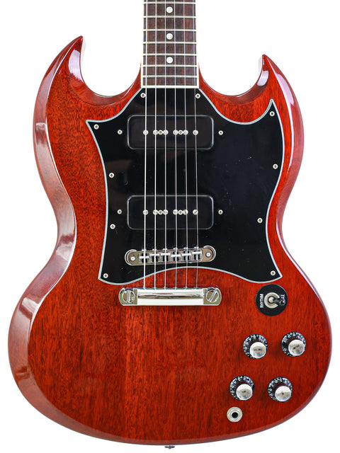 Stunning red Gibson SG Classic electric guitar with a sleek black pickguard, perfect for musicians seeking quality and style.