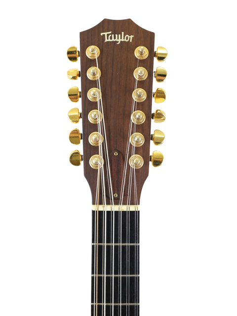 Taylor D-18E acoustic guitar displayed with a 1995 Taylor LKSM Leo Kottke 12-string, highlighting its unique design.