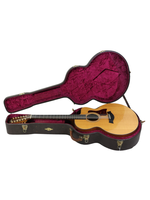 Taylor GS-1 acoustic guitar, a classic from 1995, featuring a unique design and exceptional sound for any guitarist.