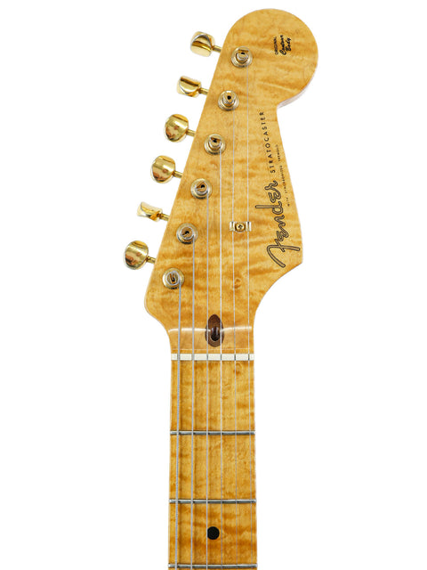 The 1992 Fender Custom Shop 'Clapton' Stratocaster, a masterbuilt guitar featuring a classic design and exceptional quality.
