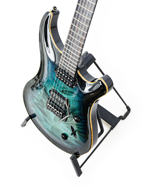 The Orthius Deluxe DC guitar features a striking blue and green finish, made in Australia in 2018, perfect for music lovers.