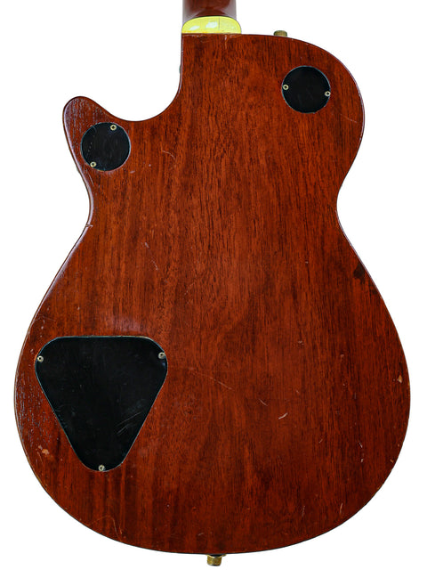 The back of a 1955 Gretsch 6130 Roundup guitar, featuring a beautifully crafted wooden body.