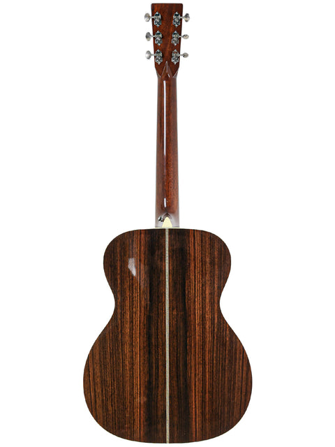 The wooden back of a 2006 Martin 000-28EC Eric Clapton Signature acoustic guitar, highlighting its craftsmanship and design.