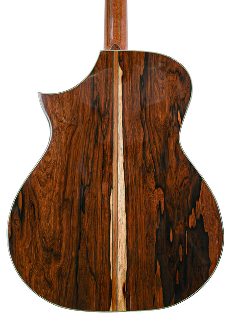 The wooden back of a guitar, highlighting its design, marked James Cargill Custom, Australia 2015.