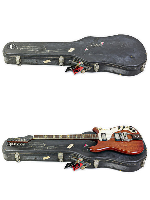 Two classic electric guitars from 1966, one with a vibrant red pickguard and the other with a stylish black pickguard.