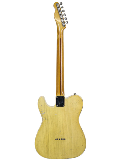 Vintage 1954 Fender Telecaster 'Blackguard' guitar with a classic wooden body and neck, showcasing timeless craftsmanship.