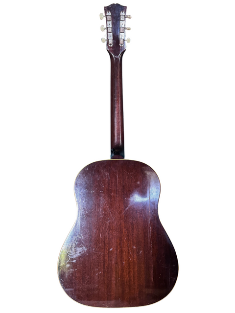 Vintage 1955 Gibson J-45 acoustic guitar, showcasing classic craftsmanship and rich tones, made in the USA.
