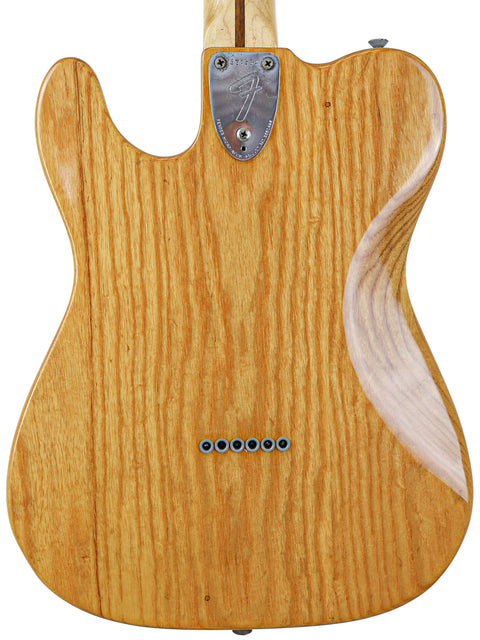 Vintage 1973 Fender Telecaster Deluxe, highlighting its elegant wooden body and neck, a true gem for guitar lovers.