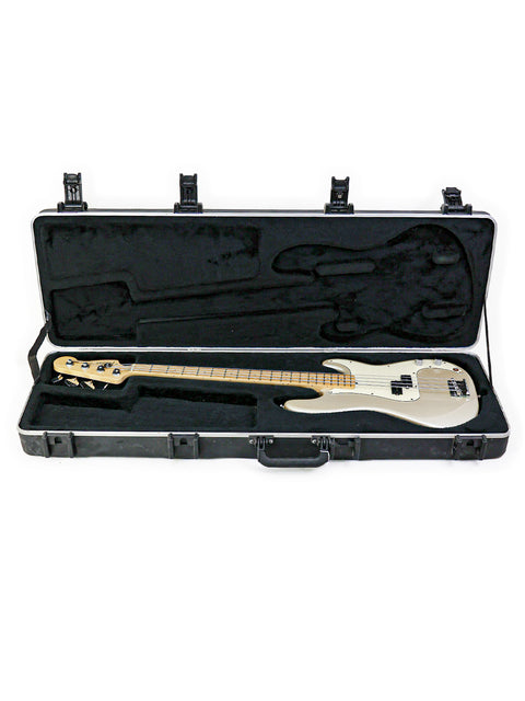 White electric bass guitar in a black hardshell case against a white background.