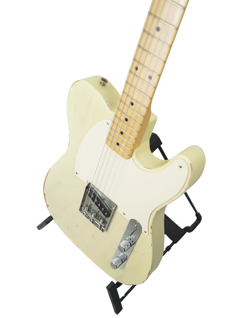White electric guitar, Fender Custom Shop '59 Esquire Journeyman Relic, 2003, resting on a sleek black stand.