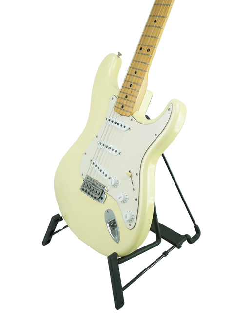 White electric guitar on a stand, highlighting the unique Fender Custom Shop Masterbuilt Dennis Galuszka Limited Edition.