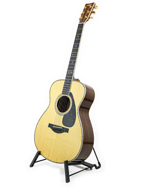 Yamaha FX-1 acoustic guitar, LS36 ARE, made in Japan in 2020, featuring a sleek design and rich sound quality.