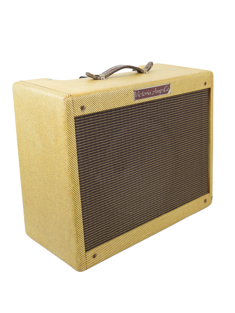 Yellow amplifier with a brown cover, model Victoria 20112-T Tweed Combo, crafted in the USA in 2004.