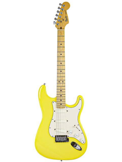 Yellow electric guitar with maple neck on a white background.