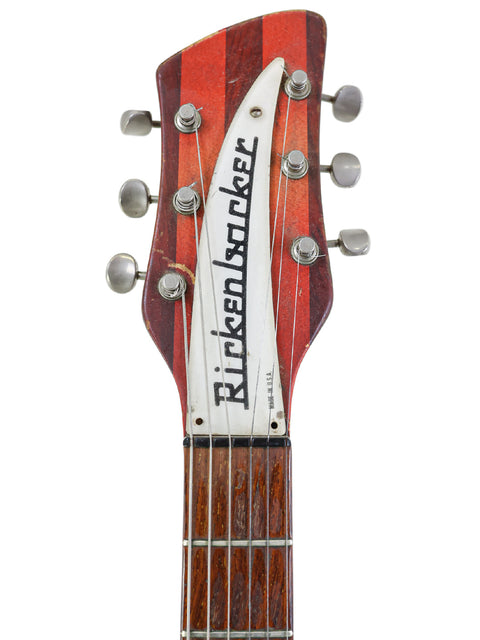 vintage Rickenbacker guitar in red and white, marked "richmond," model 345 from 1998, exuding classic style.