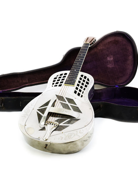 1931 National Tricone Style 2 Roundneck guitar in its case, displayed against a clean white background.