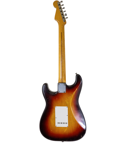 1958 Fender Stratocaster in sunburst, highlighting its original craftsmanship and vintage appeal.