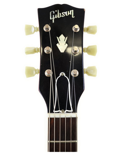 1963 Gibson Les Paul Standard electric guitar, a vintage piece known for its iconic shape and rich sound.