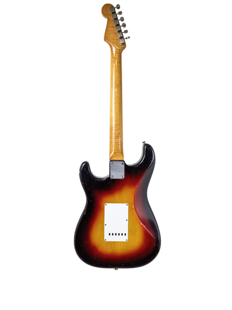 1964 Vintage Fender L Series Stratocaster featuring a sunburst finish and black pickguard, in striking Fiesta Red.