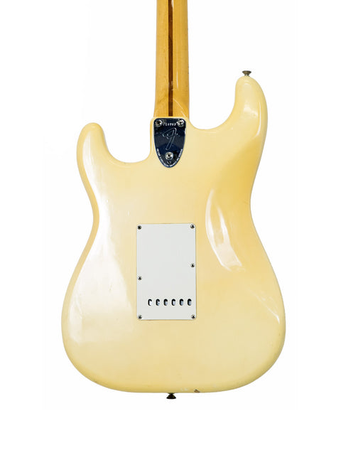1976 USA Fender Stratocaster, a white electric guitar with a beautifully crafted wooden body.