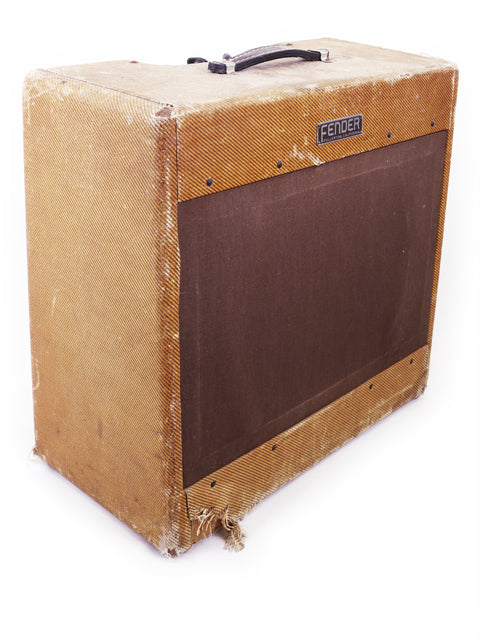 A 1952/53 vintage Fender Bassman amplifier with a brown cover, representing iconic design and rich musical history.