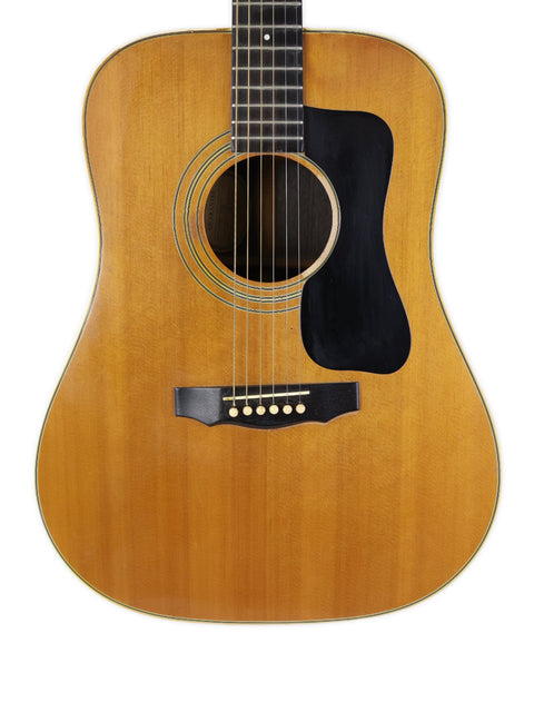 A 1974 Guild D-50 Bluegrass Special guitar displayed against a clean white background.