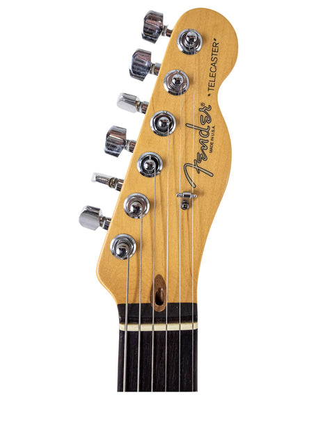 A 2002 Fender American Standard Stratocaster with Duncan pickups, showcasing its sleek design and classic sunburst finish.